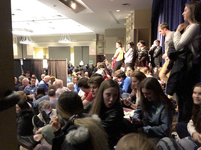 Students watch caucus action
